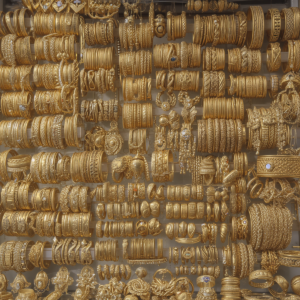 Collection of plain gold jewellery including bangles, chains, rings and necklaces